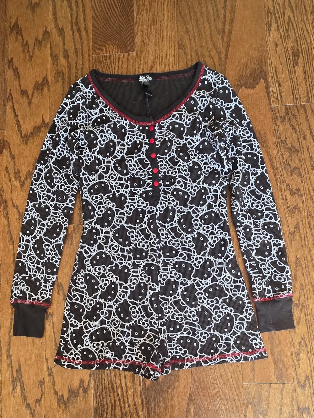 Hello Kitty Black and White Long-Sleeve Pajama Romper with Pink Accents
